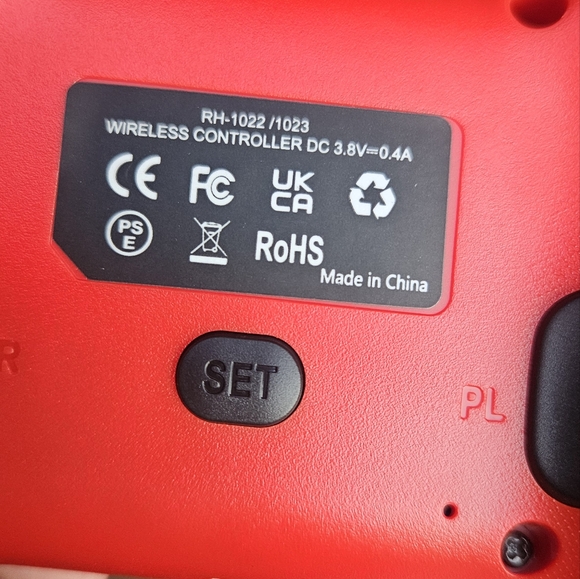 Vibrant Red and Blue Gaming Controllers - Picture 10 of 16